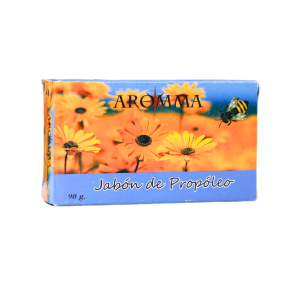 Jabón de propóleo de 90 g de la marca Aroma, envuelto en un diseño colorido con flores amarillas y una abeja. Ideal para el cuidado de la piel, este jabón natural combina propiedades antibacterianas y antioxidantes del propóleo, ofreciendo una limpieza suave y efectiva. Perfecto para quienes buscan productos de higiene personal con ingredientes naturales y beneficios para la salud de la piel.